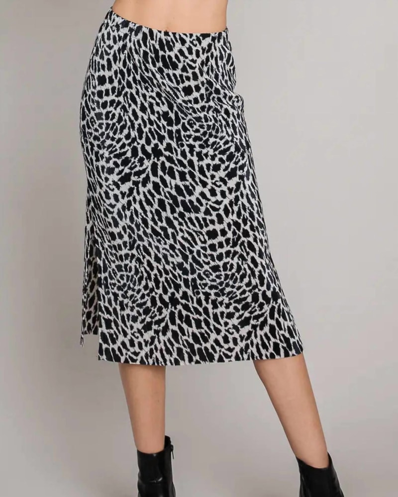 Front of a model wearing a size LARGE Midi Pleated Skirt in Black/White in Black/White by ALLIE ROSE. | dia_product_style_image_id:338532